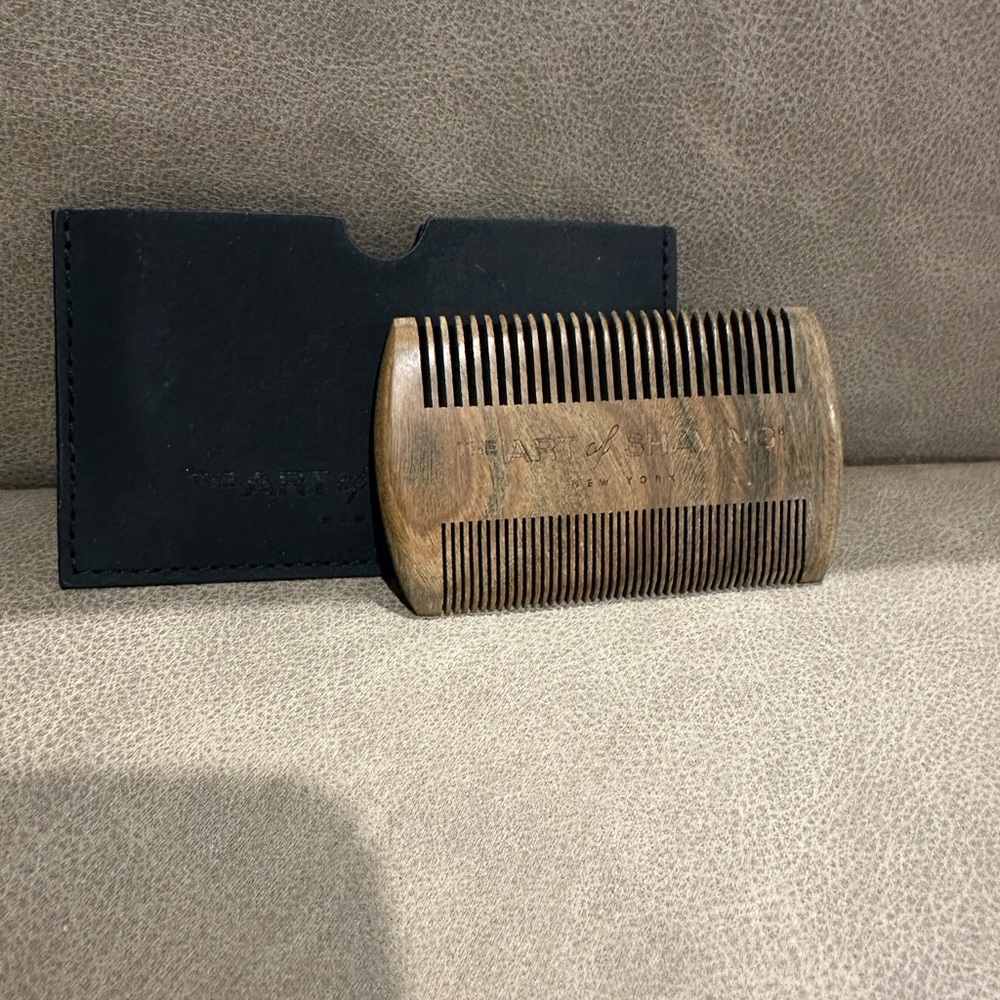 The Art of Shaving Sandalwood Beard Comb with a leather sheath.
: